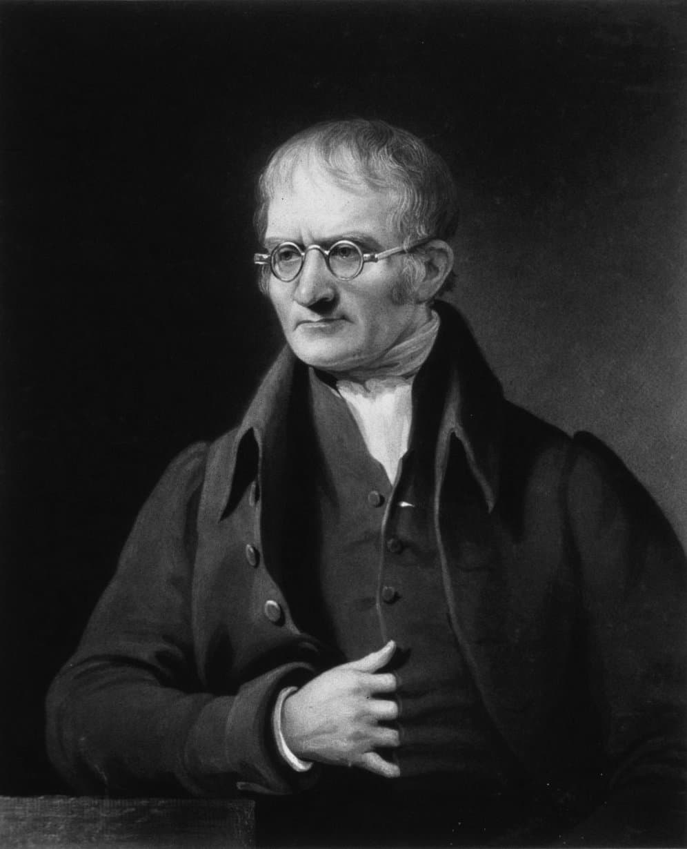 Engraved portrait of John Dalton, an older man in a dark coat with a high white collar.