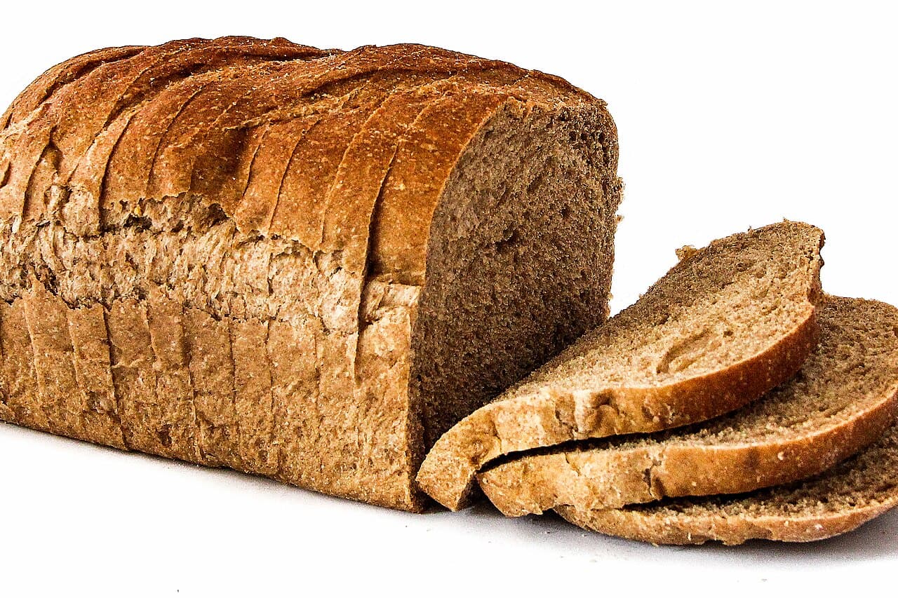 Loaves of freshly baked bread with deep golden-brown crusts