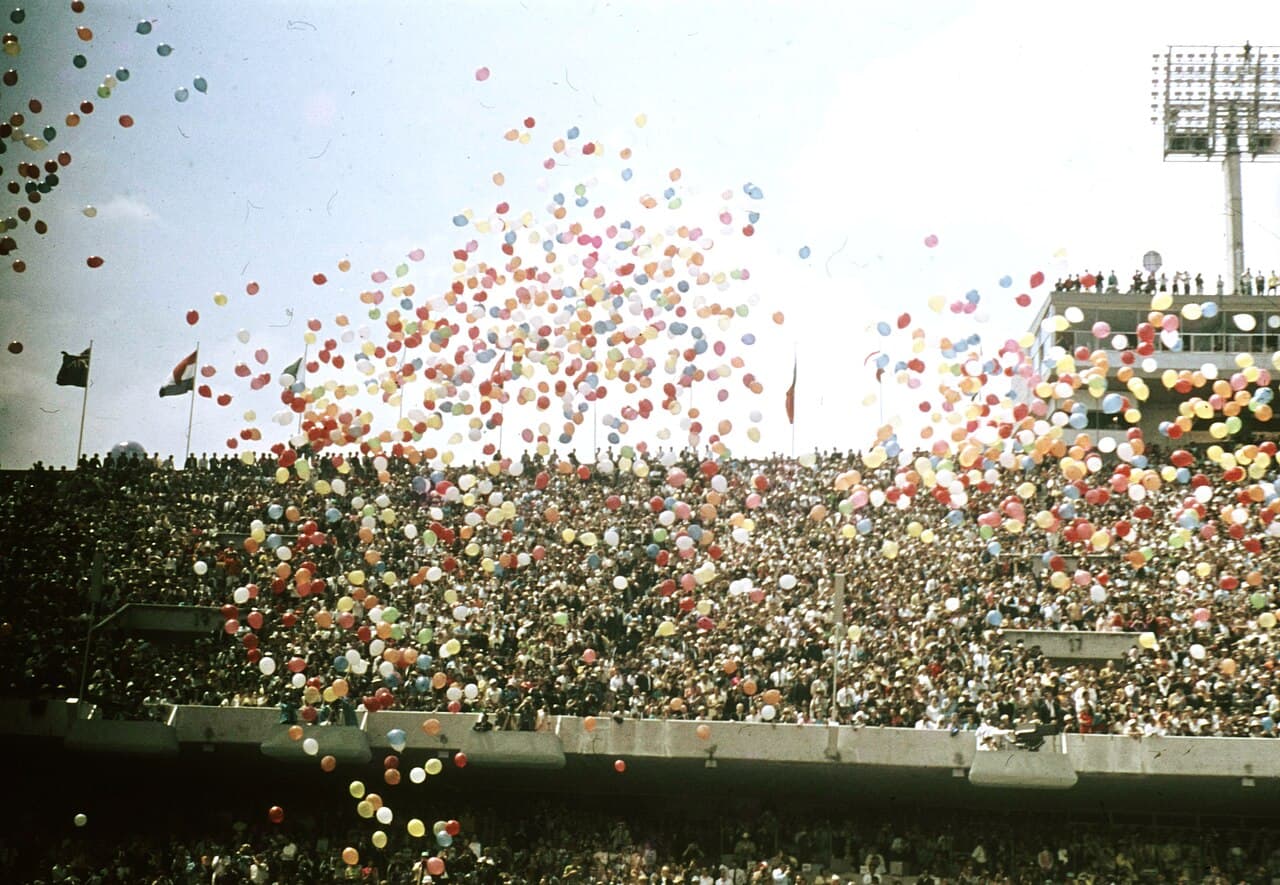 Crowded stands and field of the Estadio Olímpico Universitario in Mexico City during the opening ceremony of the 1968 Olympics