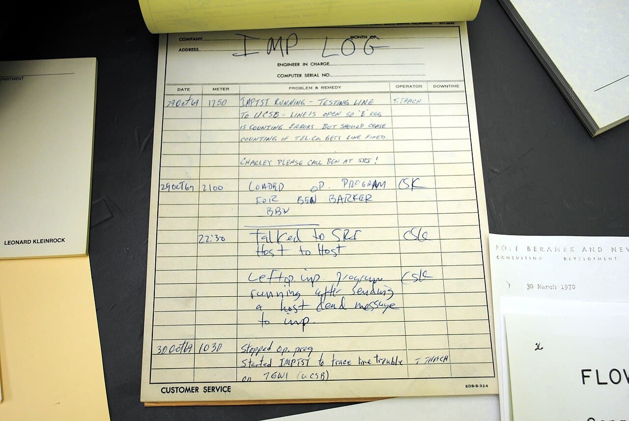 A page from a 1969 handwritten computer log book, with an entry at 22:30 on 29 October recording the connection to SRI.