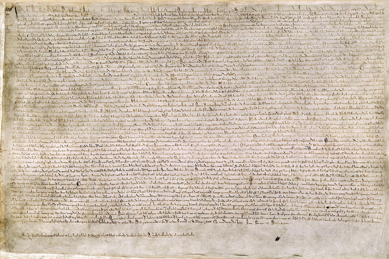 A sheet of aged parchment densely covered in tiny, even lines of medieval Latin handwriting.